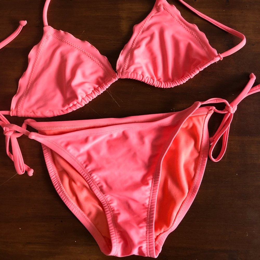 Assortment of bikini tops and bottoms. All must go